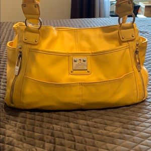 Tyler Rodan, yellow tote.